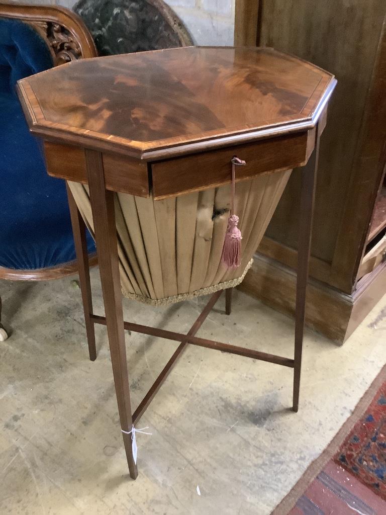 A George III banded mahogany octagonal topped work table